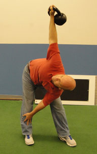 Dr. Marchese demonstrating the Kettlebell Windmill
