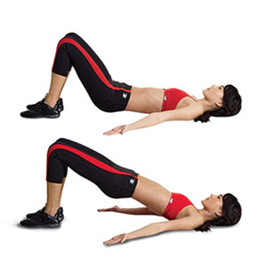 photo of a woman performing hip extensions
